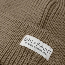 Enfant muts met oorflappen en pompom