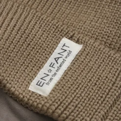 Enfant muts met pompom